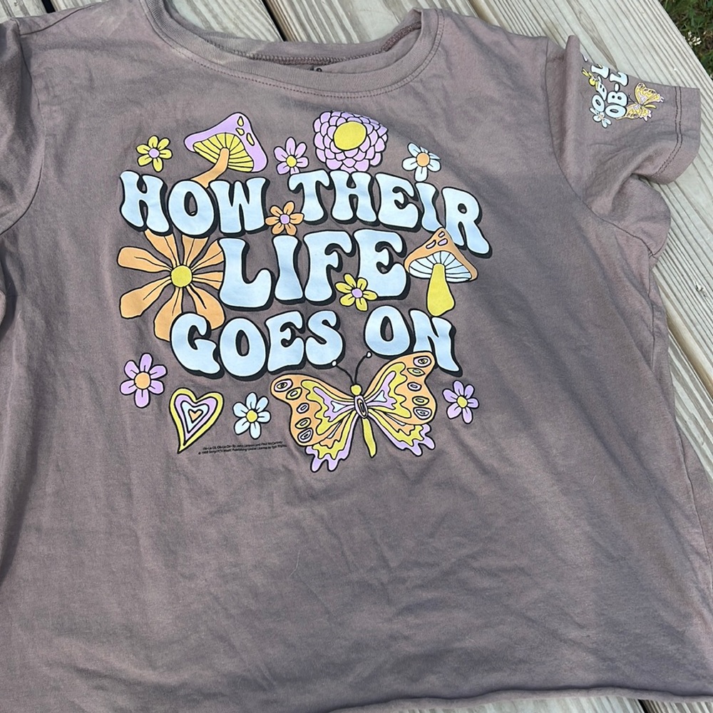 Selling A brown tee